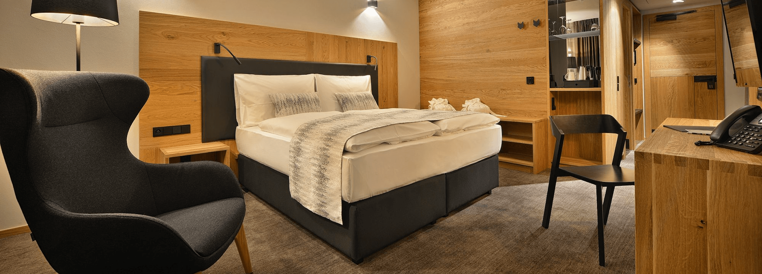 Luxury hotel room furnished by UNAR — tradition since 1991